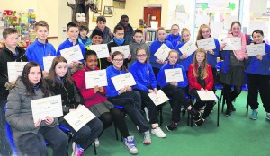 6th class pupils from Scoil Ghobnatan pictured at Mallow Library last week where the books which they wrote, illustrated and printed as part of the Write a Book Project were put on display.